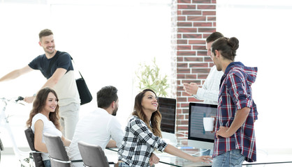 group of young employees in a modern office