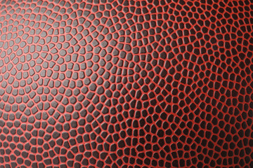 Leather American football ball as background, closeup