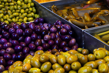 Sale of olives and pickles on the Jerusalem market in Israel.