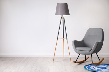 Elegant room interior with stylish comfortable armchair