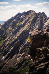 Close up view of jagged mountain peaks from a peak of the Gore Range in Colorado