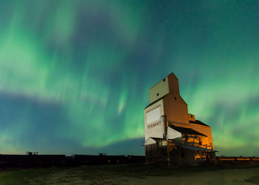Aurora Borealis over a historic grain elevator in Pennant, Saskatchewan, Canada