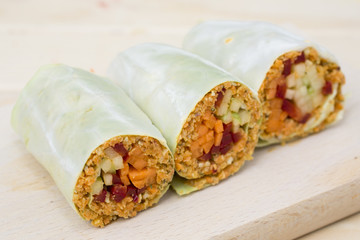 cabbage rolls with carrots. apple, pepper