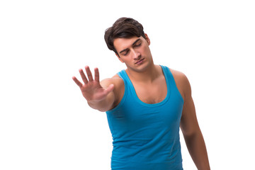 Man waking up with alarm clock isolated on white