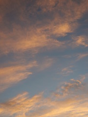 Naklejka na ściany i meble Tokyo,Japan-June 30, 2018: Dramatic sunrise sky with colorful clouds like abstract painting 