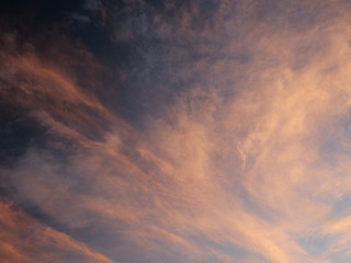 Tokyo,Japan-June 30, 2018: Dramatic sunrise sky with colorful clouds like abstract painting 
