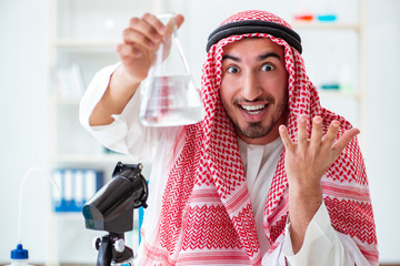 Arab chemist checking the quality of drinking water