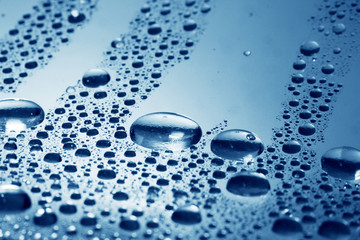 Water droplet as background / Wate is a polar inorganic compound that is at room temperature a...