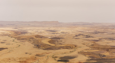 Fototapeta na wymiar Wide view of yellow Desert of Negev, Israel.