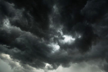 Motion of dark sky and black clouds, Dramatic cumulonimbus cloud with rainy - obrazy, fototapety, plakaty
