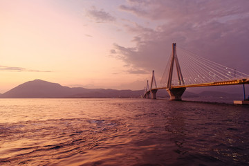 Greece, Rio Antirion suspended bridge in the twilight