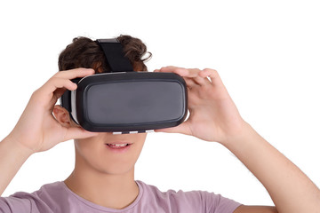 Joyful teen boy using VR goggles