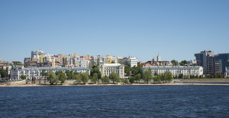 Fototapeta premium Volga river embankment in Samara, Russia. Panoramic view of the city. On a Sunny summer day. 28 June 2018