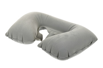 Inflatable grey travel pillow isolated on white background.