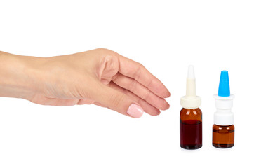 eye or ear drops glass bottle with hand isolated on white background.
