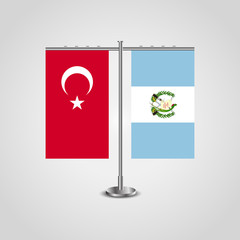 Table stand with flags of Turkey and Guatemala.Two flag. Flag pole. Symbolizing the cooperation between the two countries. Table flags
