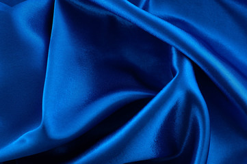Abstract silk luxury background, piece of cloth, deep blue cloth texture