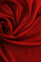 Abstract silk luxury background, piece of cloth, deep red cloth texture