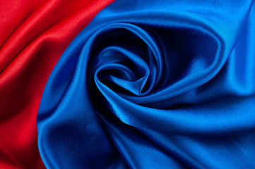 Abstract silk luxury background, piece of cloth, deep red and blue cloth texture
