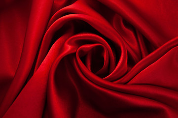 Abstract silk luxury background, piece of cloth, deep red cloth texture