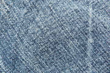 blue denim fabric close-up of gin natural material for clothing cotton rough linen background for decoration