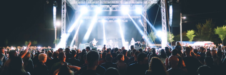 Fototapeta na wymiar Crowd of people in a concert