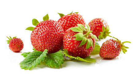 fresh red strawberries with green leaves