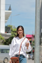 A woman walking on the street in Thanh Hoa, Vietnam