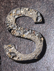 Written Wording in Distressed State Typography Found Letter S