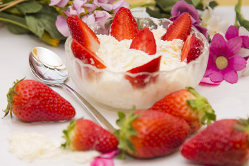 bowl of strawberries with cream