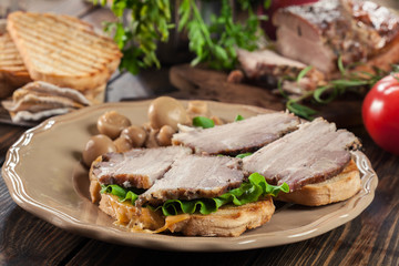 Sandwich with baked pork belly