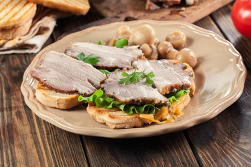 Sandwich with baked pork belly