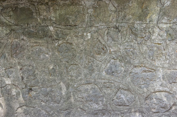 Texture of an old stone wall. Fragment of an old park stone fence