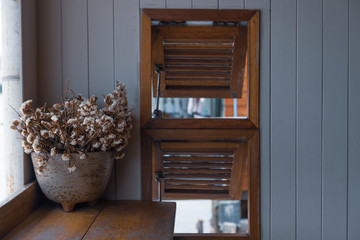 Antique vase with dry flower