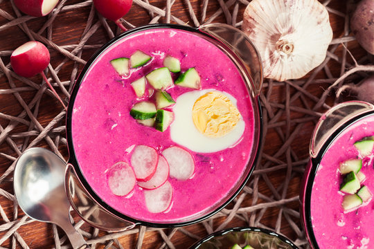 Cold beet soup with egg, cucumber and greens