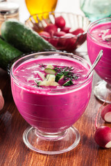 Cold beet soup with egg, cucumber and greens