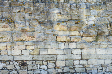 Ancient stone wall, texture. Background from an ancient masonry