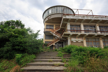 Abandoned hotel and restaurant in state of disrepair