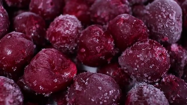 Frozen cherry sweet cherries rotating pattern macro texture background backdrop footage video.