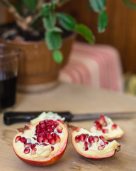 pomegranate - tasty and ripe red grain (harvest). food background