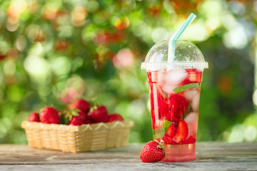 strawberry lemonade in plastic glass