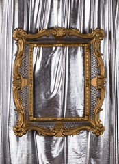 elegant Victorian gilded baroque frame, silver shiny background