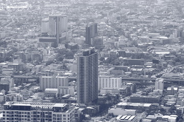 Black and white toned image of urban landscape of Bangkok city