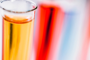 test tubes with colorful liquid. Pharmacy and medical background.