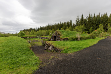 Fototapeta na wymiar Stone hut with grass roof in Reykholt. Iceland