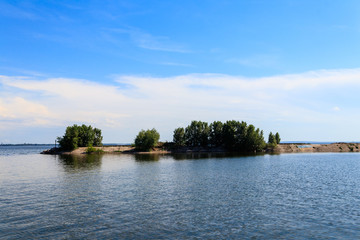 Fototapeta premium Summer landscape with beautiful lake, green trees and blue sky