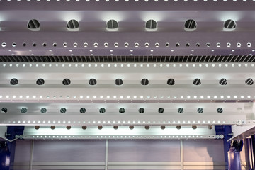 Metalware from profiled sheet and metal I-beams with holes