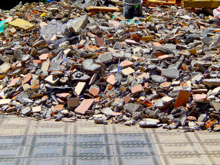 Full construction waste debris bags, garbage bricks, pile of rubble and material from demolished...