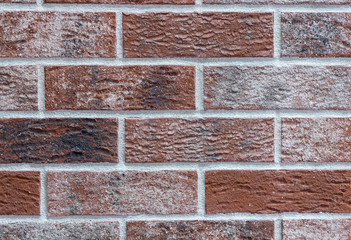 Brown brick wall. background