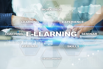 E-Learning on the virtual screen. Internet education concept.